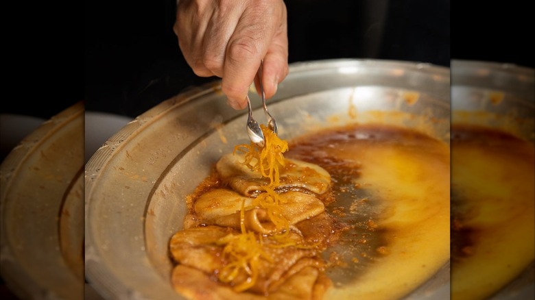 Crêpes Mademoiselle being prepared tableside