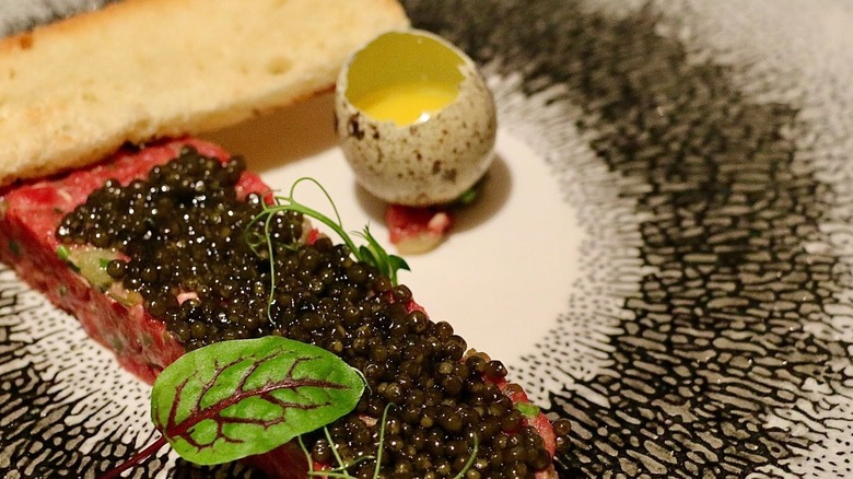 Venison tartar with caviar and quail egg