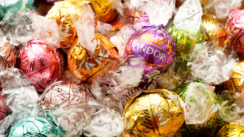 Lindt Lindor truffle balls of different colors piled up