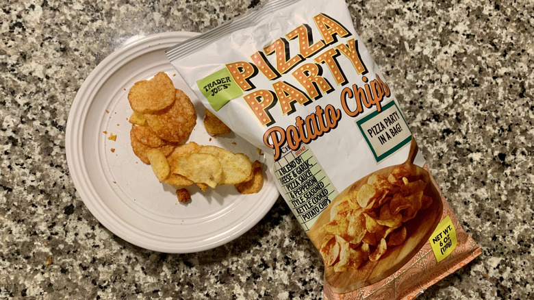Bag of Trader Joe's pizza potato chips and plate of chips