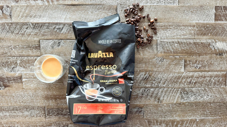 Lavazza espresso gran crema on wooden surface