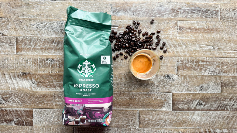 Starbucks whole bean espresso on wooden table