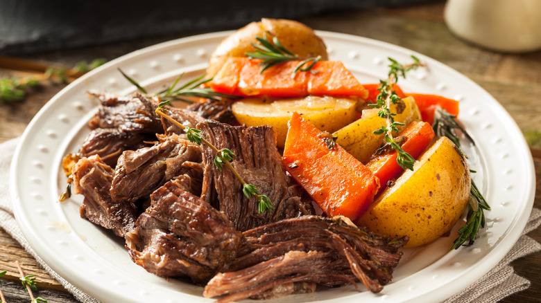 Plate of pot roast and veggies.