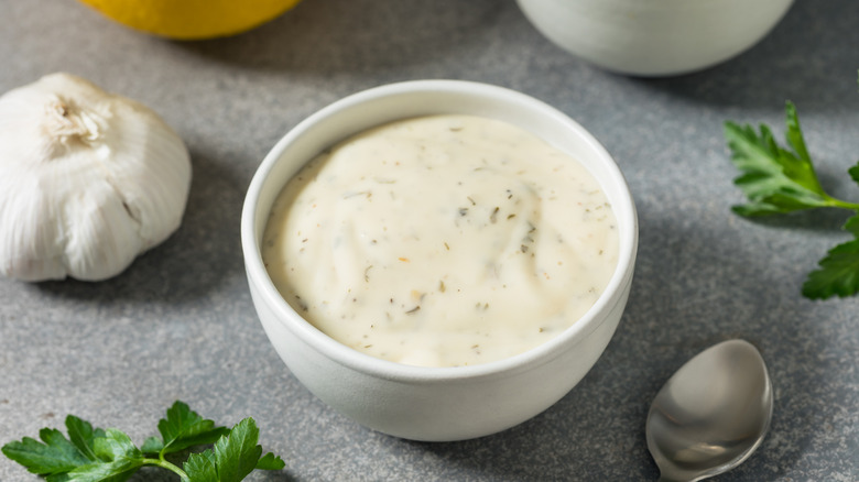 Overhead view of creamy cottage cheese ranch dressing in a bowl