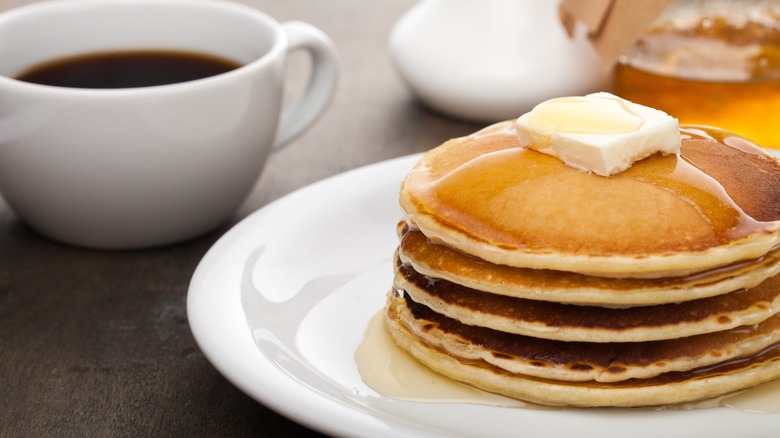 Pancakes with coffee mug