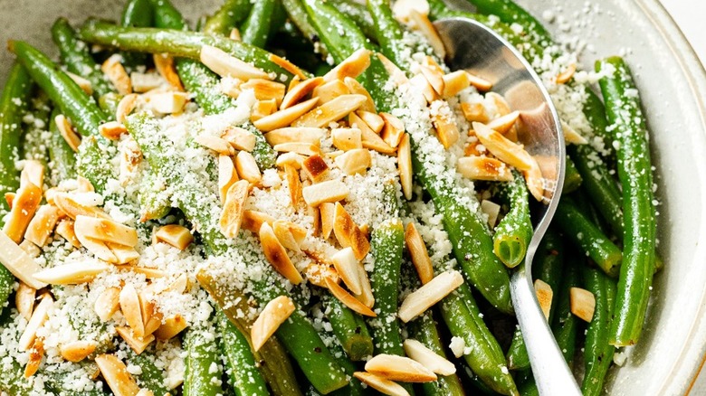 Add Parmesan Cheese To Green Bean Almondine For A Salty Kick