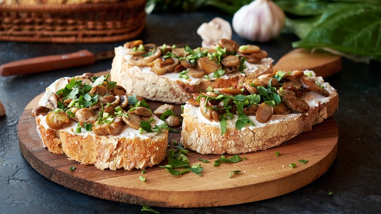 sandwich topped with garlic cream cheese