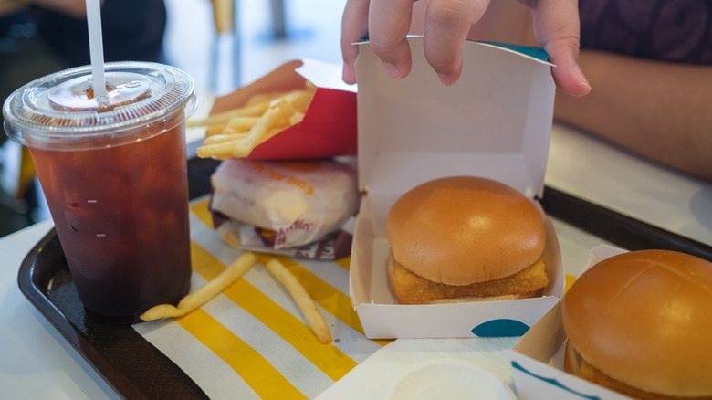 McDonald's tray with drink, fries, and open box of Filet-o-Fish