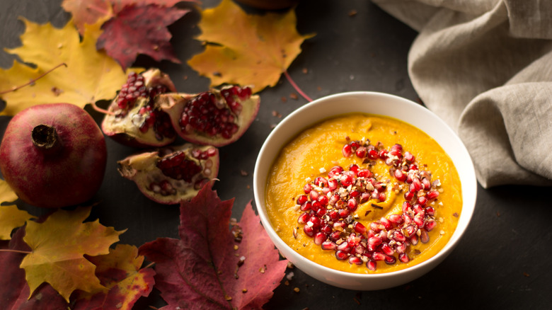 Butternut squash soup with pomegranate seeds