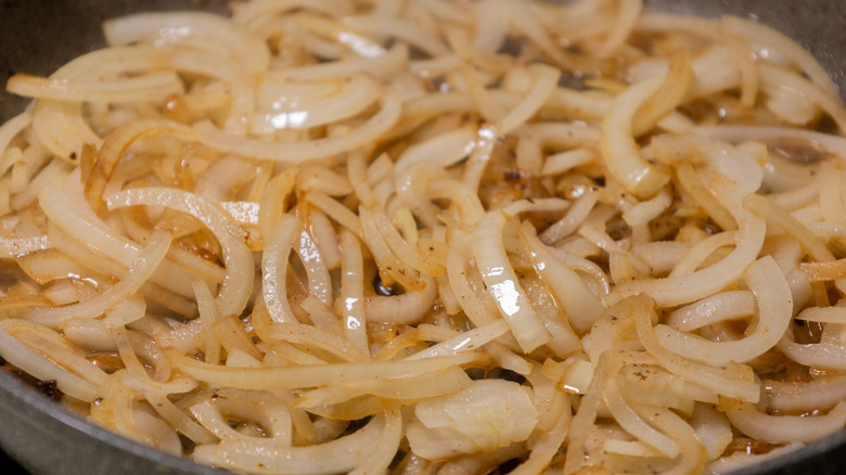 caramelized sliced onions in a skillet