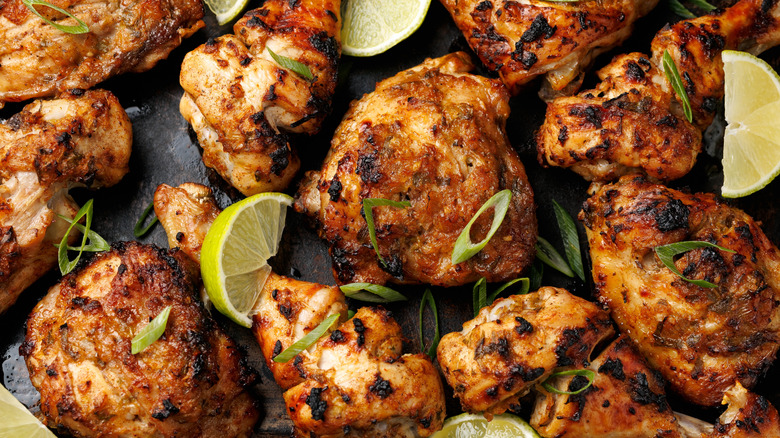 a tray of golden roasted chicken thighs