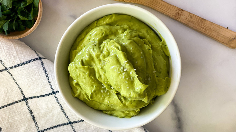 Overview of savory avocado mousse in bowl 