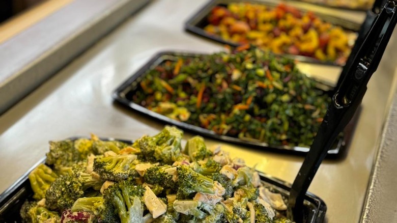Salads on the buffet at Q. Cumbers