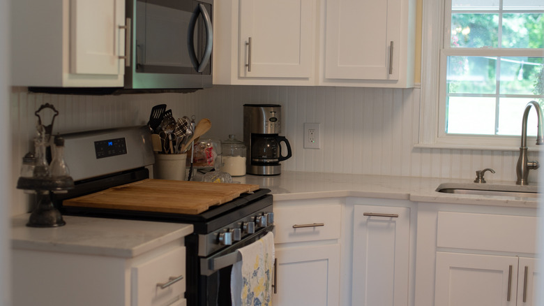 Kitchen interior with a white beadboard backsplash