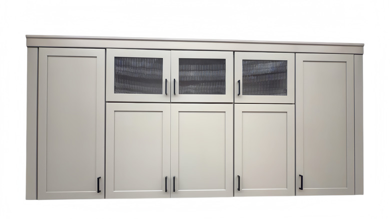 An isolated image of grey shaker cabinets against a white background