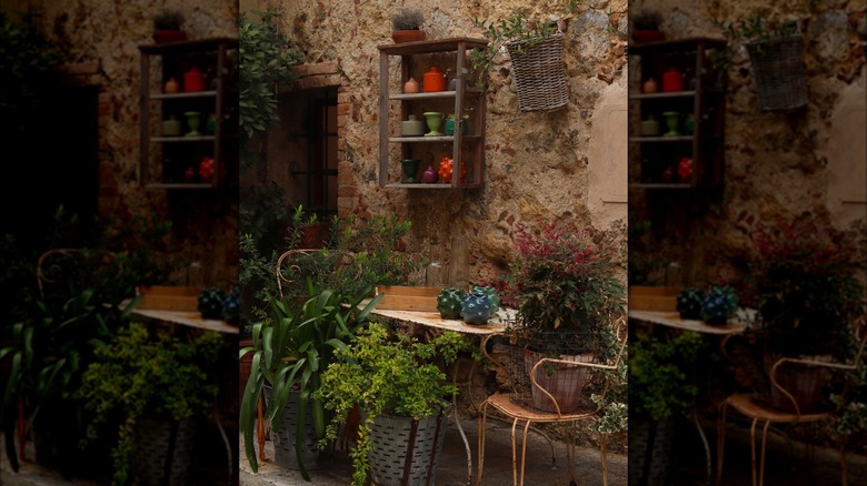 A view of a rustic courtyard in Italy