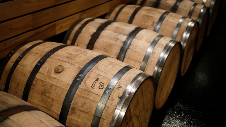 Bourbon barrels aging in a cellar