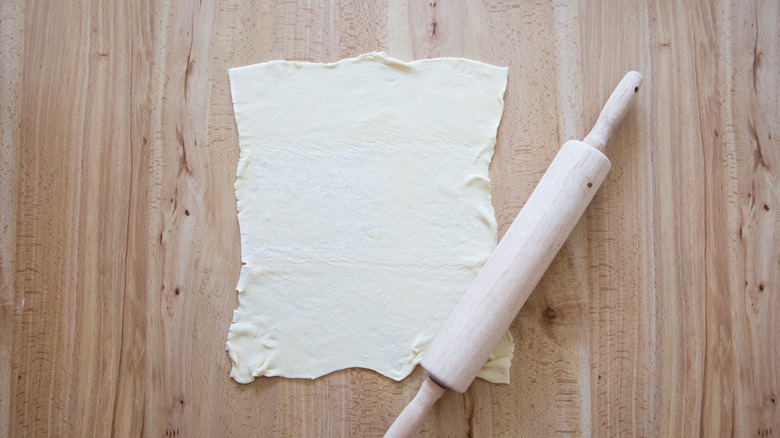 puff pastry unrolled on table
