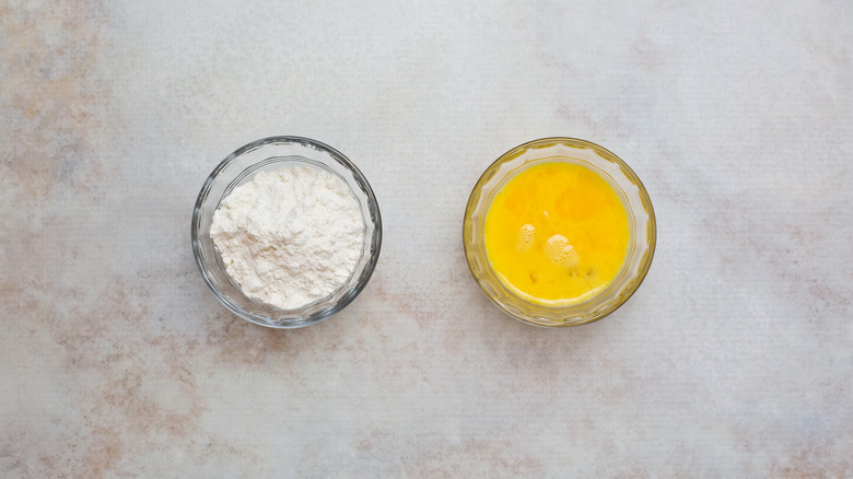 flour and egg in dishes