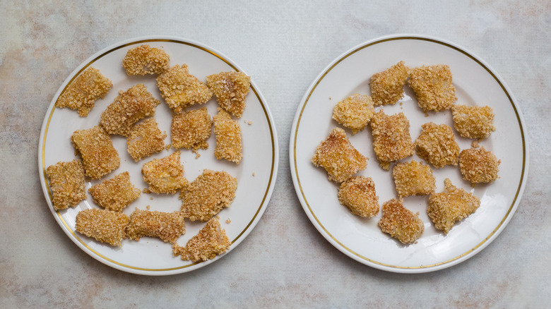 breaded fish nuggets on plates