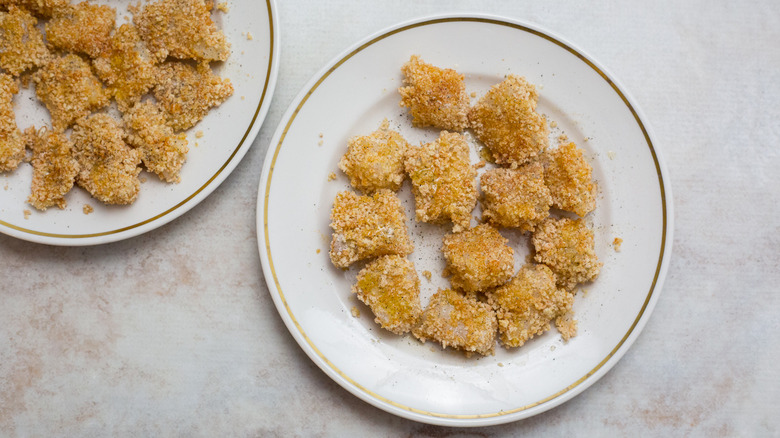 breaded fish nuggets on plates