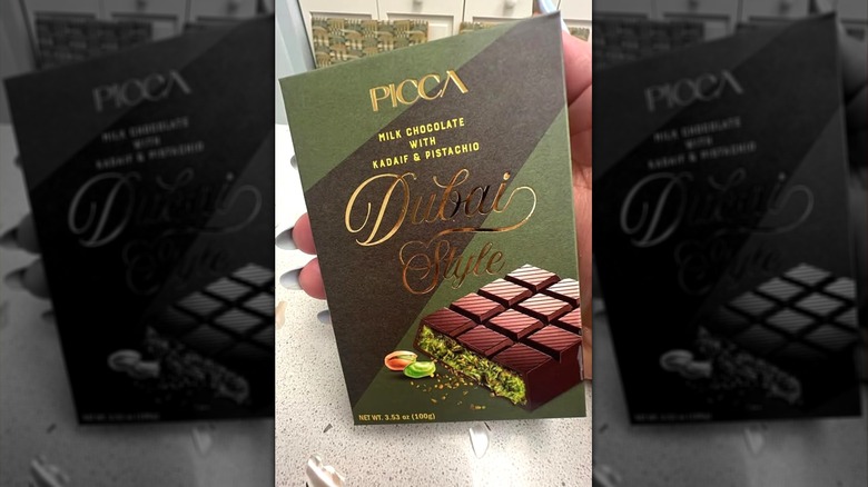 The PICCA Dubai Style Milk Chocolate with Kadaif & Pistachio package on a kitchen counter