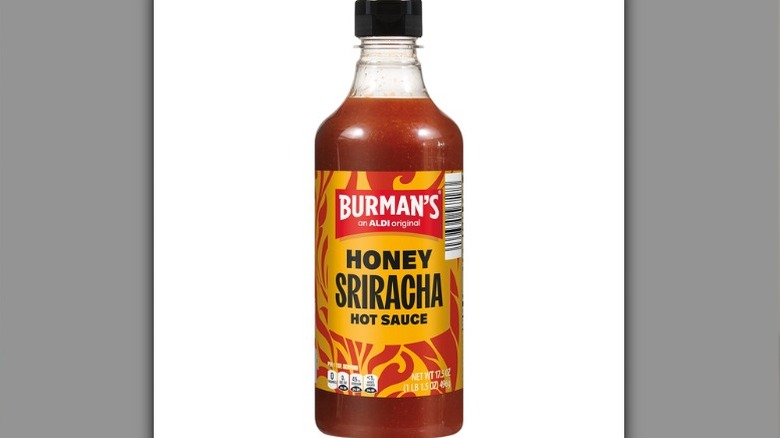 A bottle of Burman's Honey Sriracha Hot Sauce.