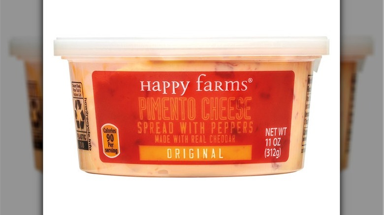 A container of Happy Farms pimento cheese spread.