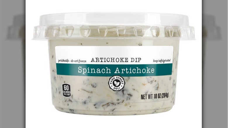 A container of Park Street Deli spinach artichoke dip.