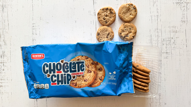 Benton's chocolate chip cookies and package on a white wooden surface