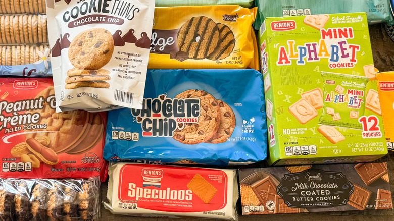 Several packages of Aldi cookies on a wooden table