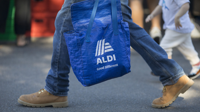 shopper with aldi bag