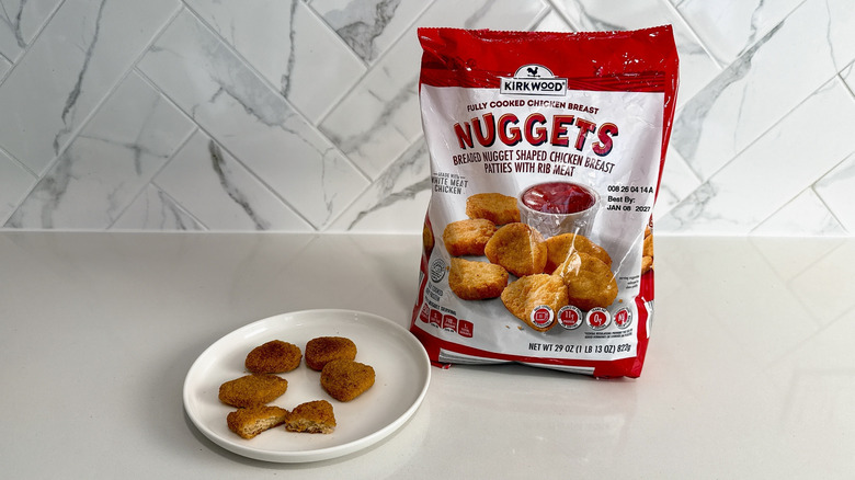 Kirkwood chicken nuggets on a plate with product bag alongside