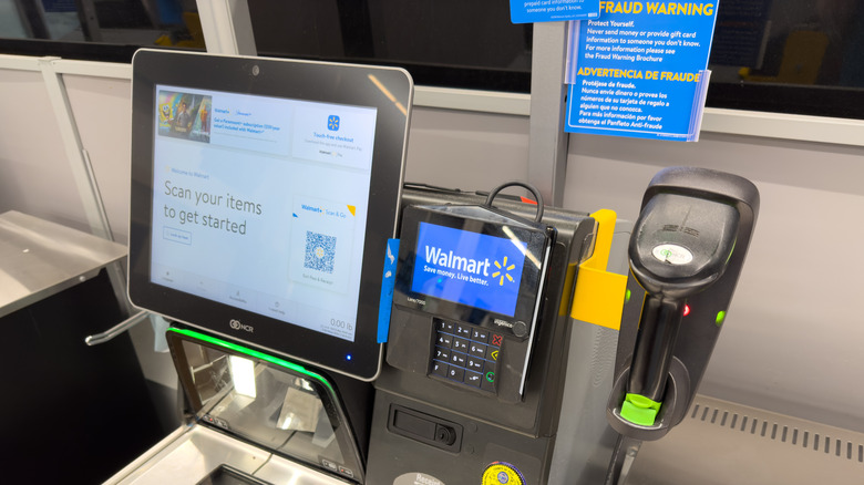 Self-checkout kiosk inside Walmart store