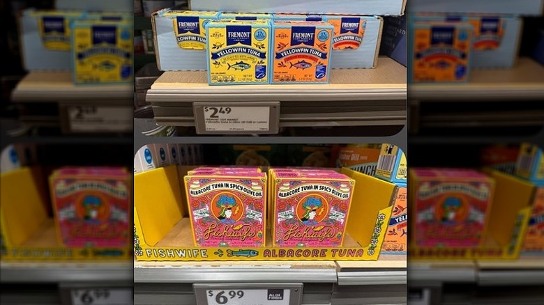 Boxes of Aldi's Fremont Fresh Market tuna and Fishwife's tuna in an Aldi supermarket