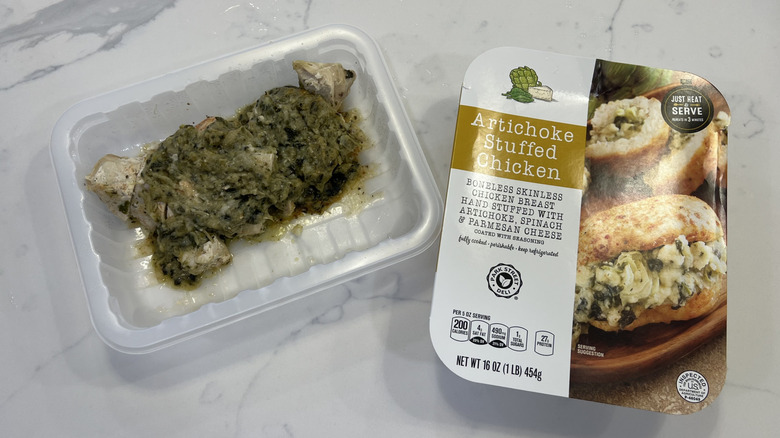 Aldi Park Street Deli artichoke stuffed chicken in plastic tray.