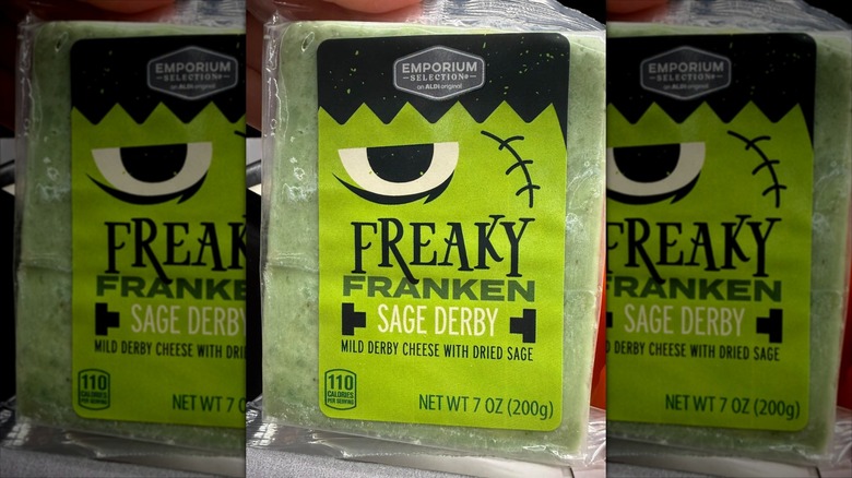 A package of green Emporium Selection Freaky Franken Sage Derby Cheese from Aldi