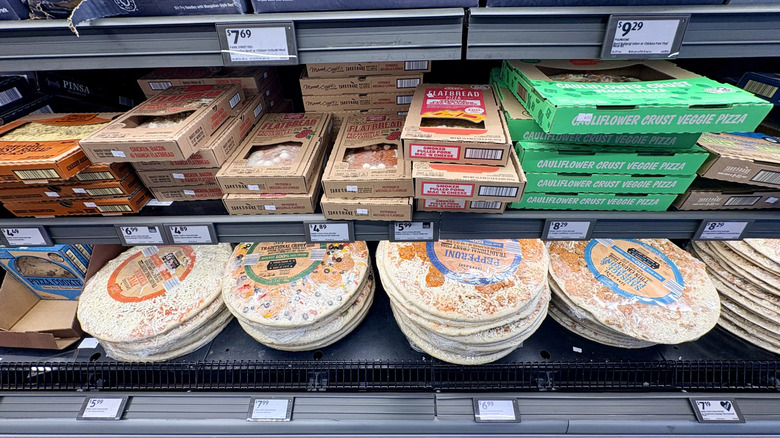 Aldi's frozen pizzas stacked up in frozen aisle