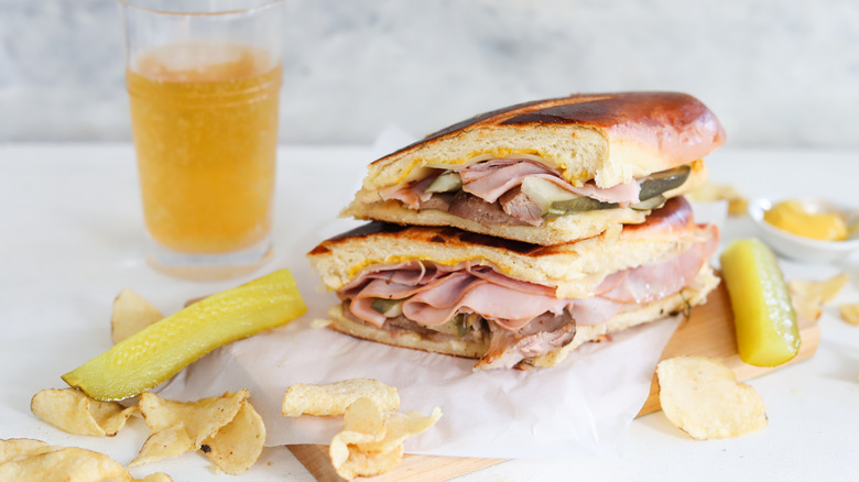 stacked Cuban sandwich with chips