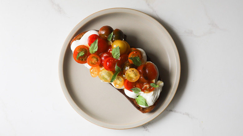Cherry tomato bruschetta on plate