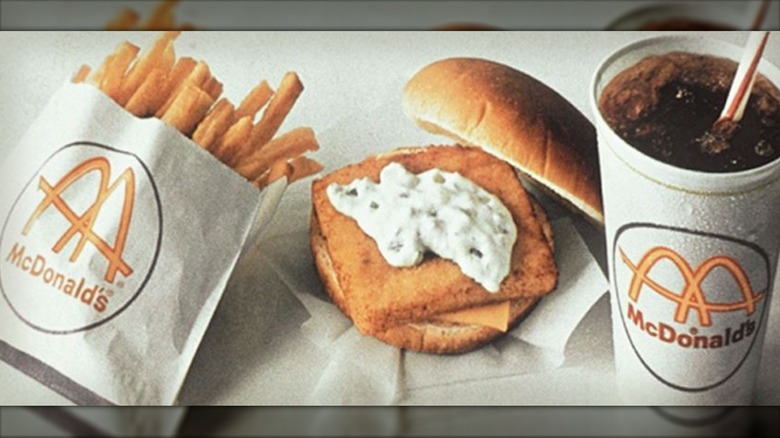 A 1960s advertisement for a McDonald's Filet-O-Fish sandwich, fries, and a drink