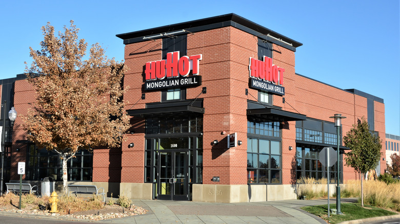Exterior of a HuHot Mongolian Grill location during the daytime