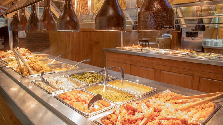 Buffet trays of hot food inside a Western Sizzlin location