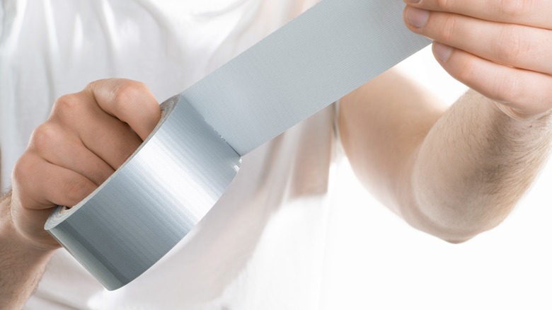 Person duct tape white background