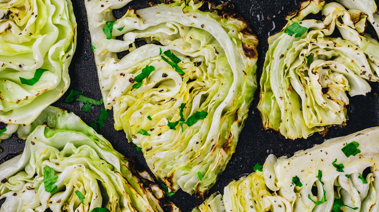 Cabbage wedges seasoned on a pan