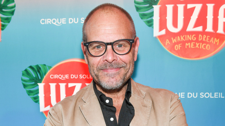 Alton Brown smiling at event