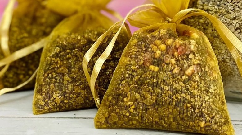 Ribbon-tied sachets filled with dried herbs and spices