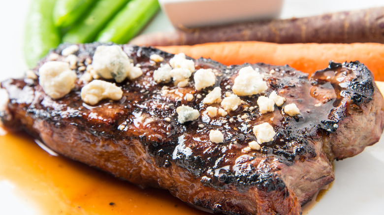 Steak with blue cheese crumbles