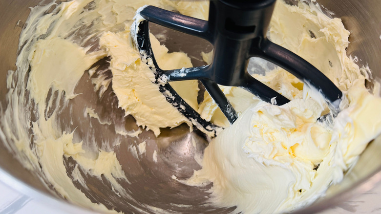 Beaten butter and cream cheese in stand mixer bowl