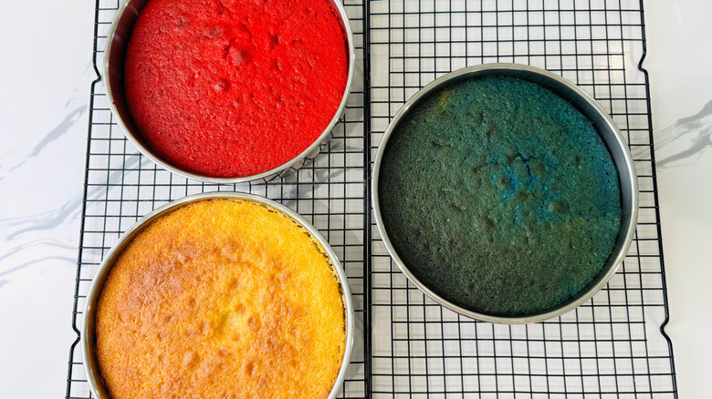 Red, white, and blue baked cakes in pans
